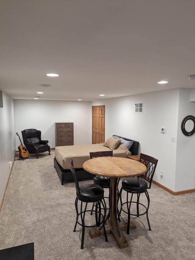 835 Mockingbird Ln, Plymouth, WI 53073 - dining space featuring light colored carpet, recessed lighting, and baseboards