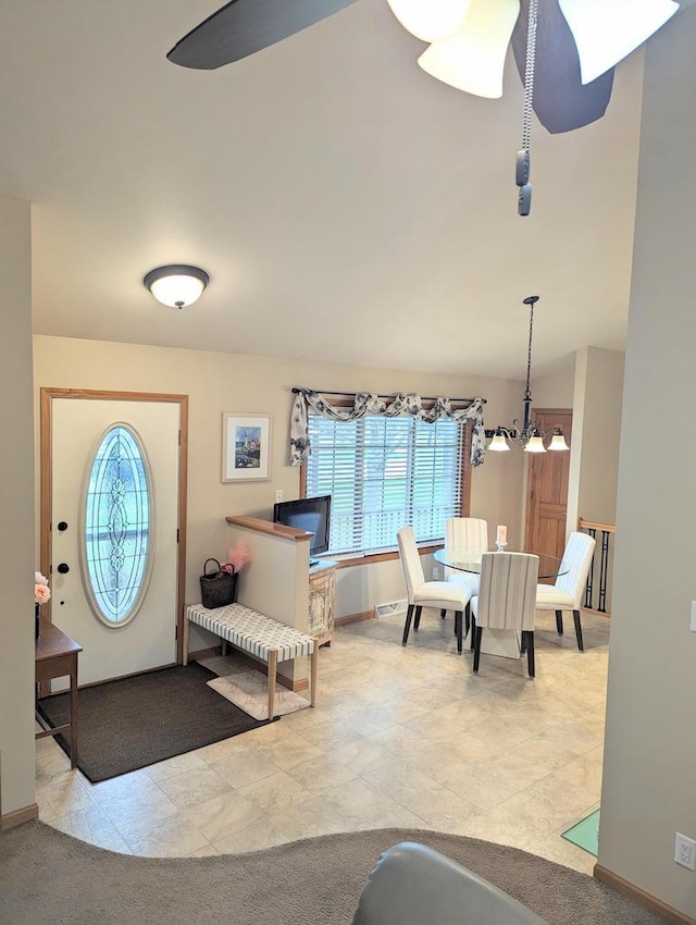 835 Mockingbird Ln, Plymouth, WI 53073 - entryway with plenty of natural light, a chandelier, and baseboards