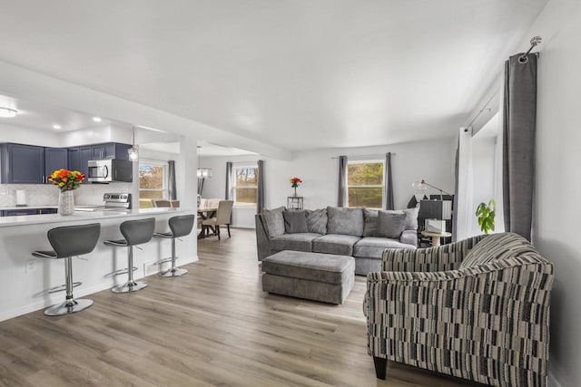 living area featuring light wood-style floors