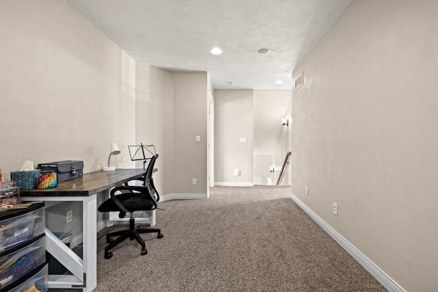 office area with baseboards, carpet flooring, and visible vents