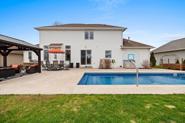 outdoor pool with a gazebo, an outdoor hangout area, and a patio