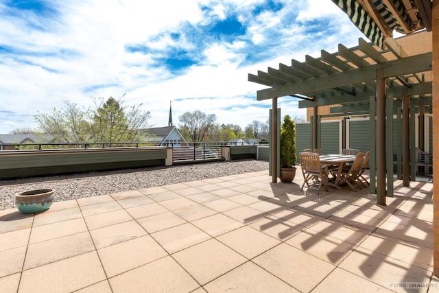view of patio with a pergola and outdoor dining area