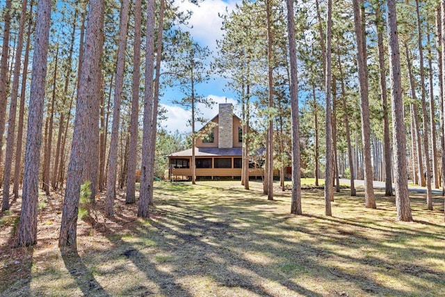 W5929 Driftwood Ln, New Lisbon, WI 53950 - view of front of house featuring a chimney