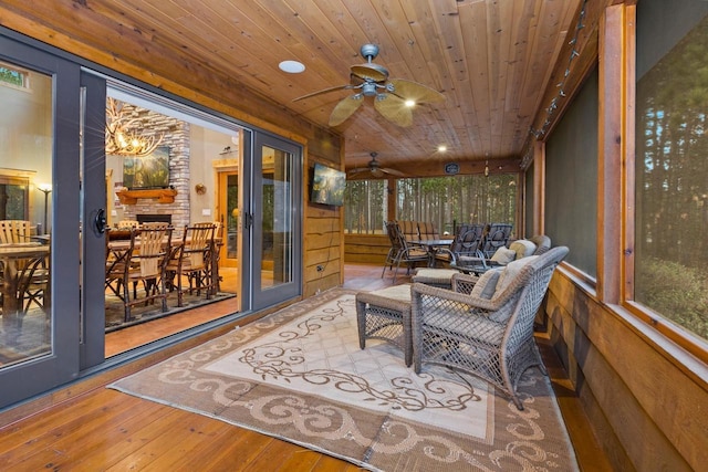 W5929 Driftwood Ln, New Lisbon, WI 53950 - sunroom / solarium with ceiling fan, hardwood / wood-style floors, wood ceiling, and french doors