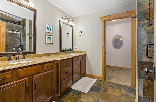 W5929 Driftwood Ln, New Lisbon, WI 53950 - bathroom with double vanity, stone finish flooring, and a shower stall