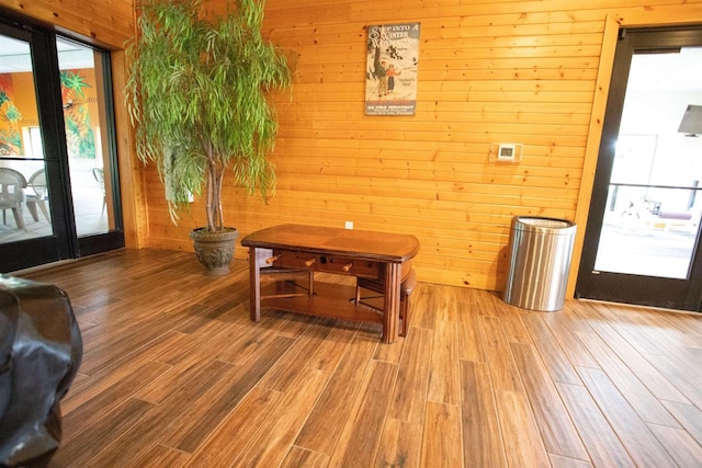 W5929 Driftwood Ln, New Lisbon, WI 53950 - dining space featuring light wood-style flooring and wood walls