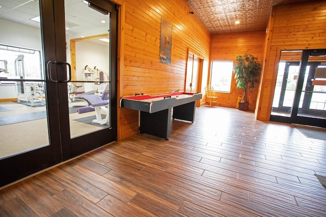 W5929 Driftwood Ln, New Lisbon, WI 53950 - playroom with wooden walls, hardwood / wood-style flooring, and recessed lighting