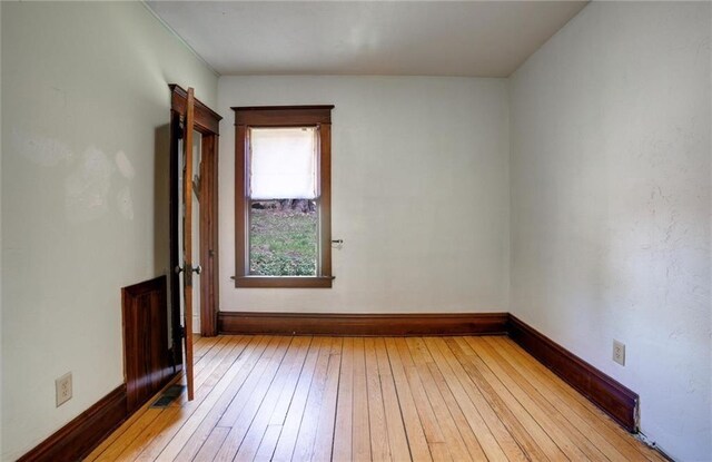 1725 Meadow Hill Dr, Menomonie, WI 54751 - spare room featuring light wood-style floors and baseboards