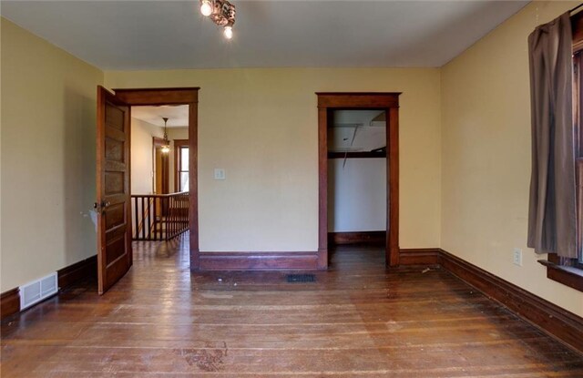 1725 Meadow Hill Dr, Menomonie, WI 54751 - empty room featuring visible vents, baseboards, and hardwood / wood-style flooring