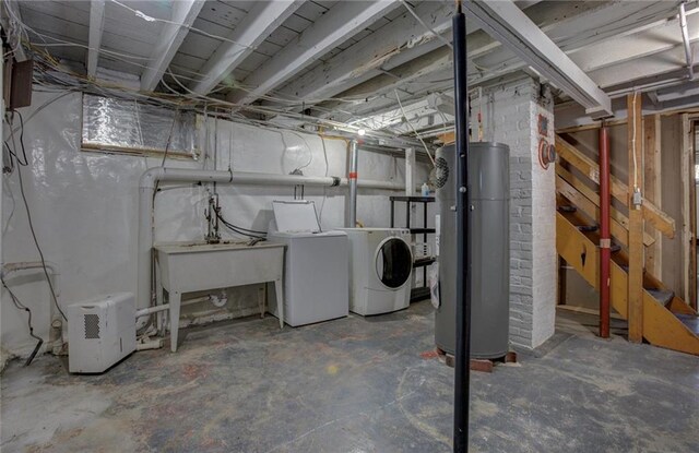 1725 Meadow Hill Dr, Menomonie, WI 54751 - unfinished basement featuring washing machine and clothes dryer and water heater