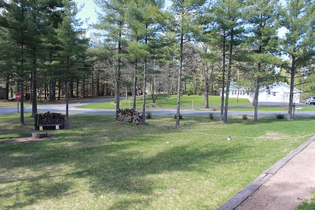 surrounding community with a yard