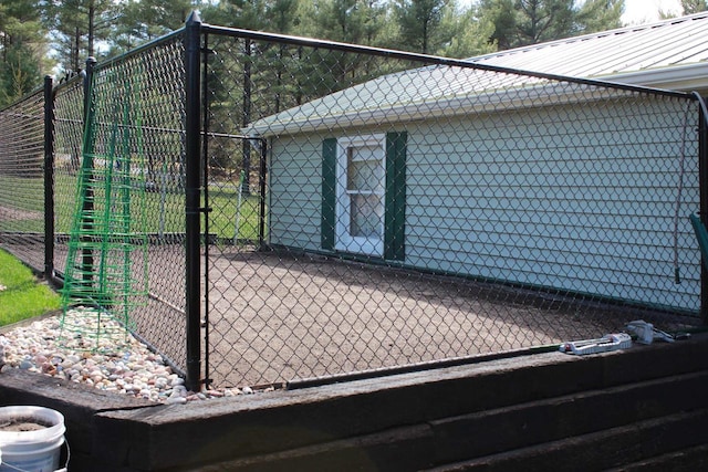 view of home's exterior with fence