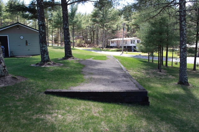 surrounding community with a yard