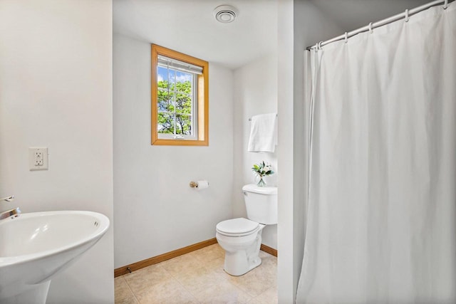 3631 Flagstone Cir, Middleton, WI 53562 - full bath with baseboards, toilet, curtained shower, and tile patterned flooring