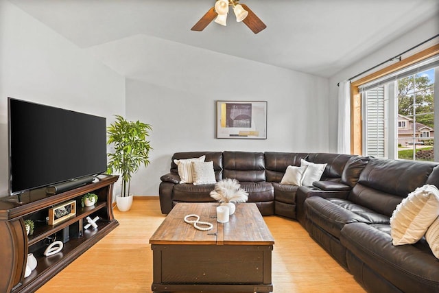 3631 Flagstone Cir, Middleton, WI 53562 - living room with vaulted ceiling, ceiling fan, light wood-style floors, and baseboards