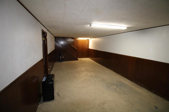 finished below grade area with wood walls and wainscoting