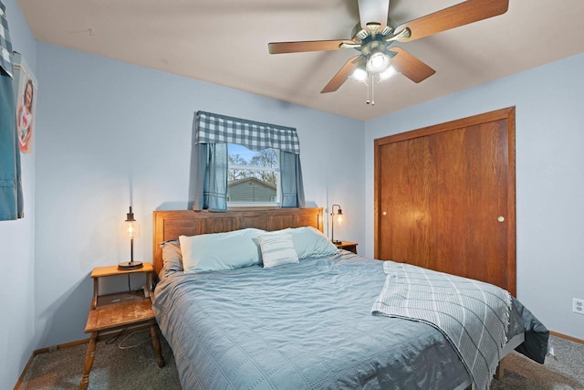 carpeted bedroom with a ceiling fan, baseboards, and a closet