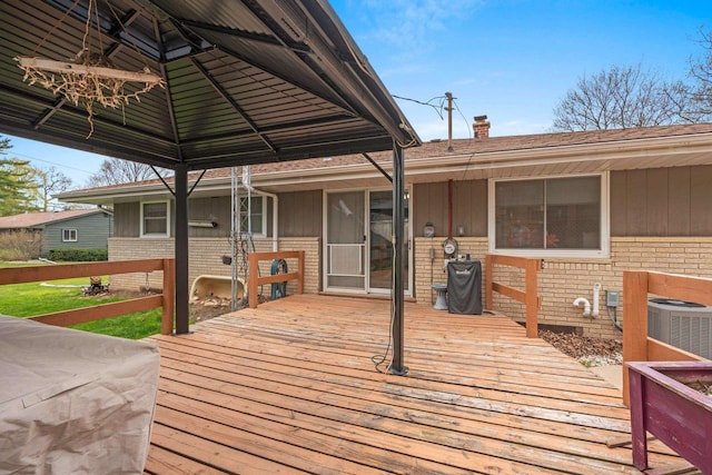 deck with a gazebo and central AC