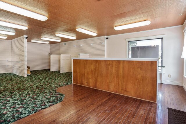 spare room with dark wood-style floors