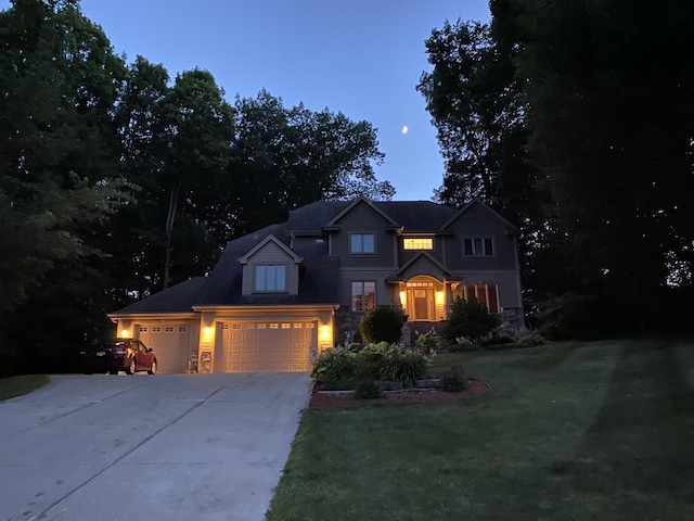 765 Safer Ct, Brookfield, WI 53045 - view of front of home with an attached garage, a front yard, and driveway