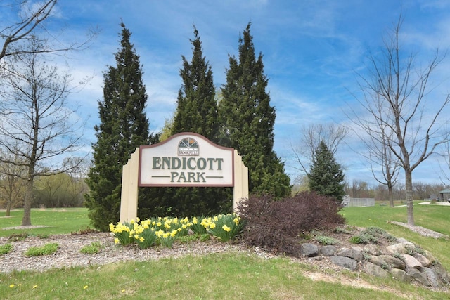 765 Safer Ct, Brookfield, WI 53045 - community sign featuring a lawn