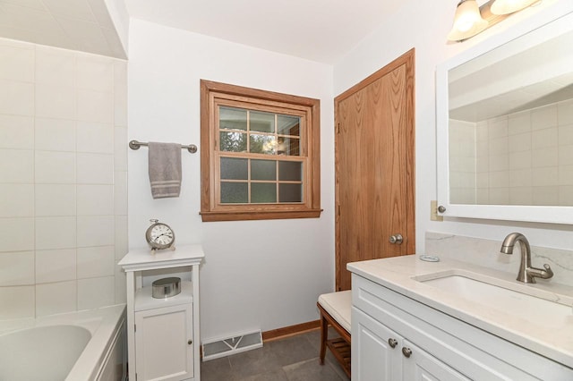 bathroom with visible vents, vanity, baseboards, shower / tub combination, and tile patterned floors