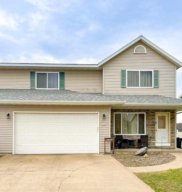 2193 Julie Ave, Sparta, WI 54656 - view of front facade featuring concrete driveway and an attached garage