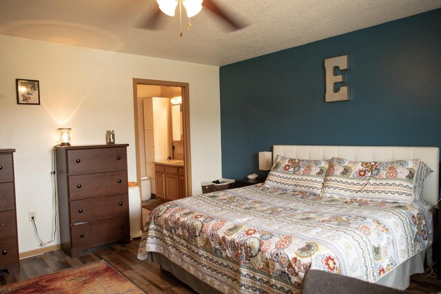 2193 Julie Ave, Sparta, WI 54656 - bedroom featuring a ceiling fan, wood finished floors, and connected bathroom