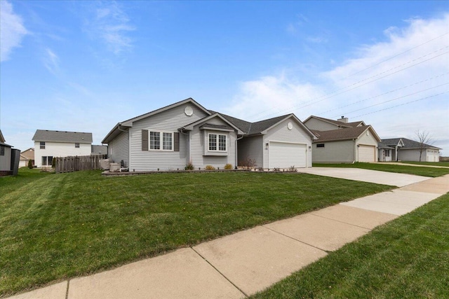 single story home with fence, driveway, a front lawn, and a garage
