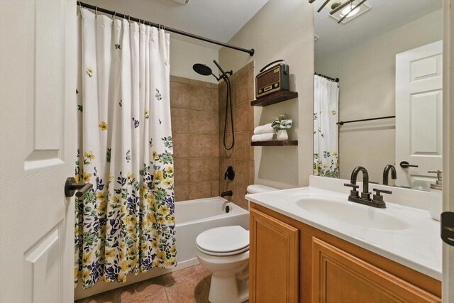 bathroom with tile patterned flooring, shower / bathtub combination with curtain, toilet, and vanity