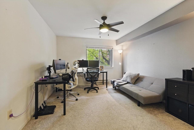 home office featuring carpet flooring and ceiling fan