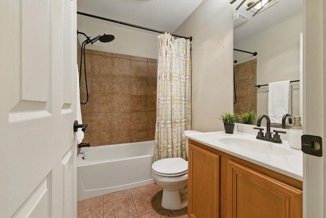 bathroom featuring toilet, tile patterned floors, shower / bathtub combination with curtain, and vanity