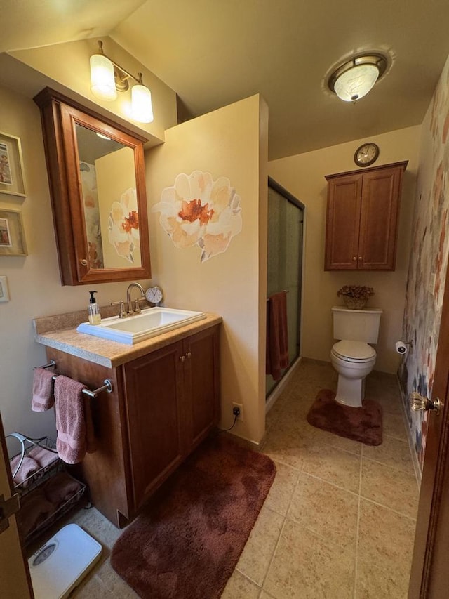 3216 Moorland Ave, Racine, WI 53405 - full bathroom featuring tile patterned flooring, vanity, toilet, lofted ceiling, and a stall shower