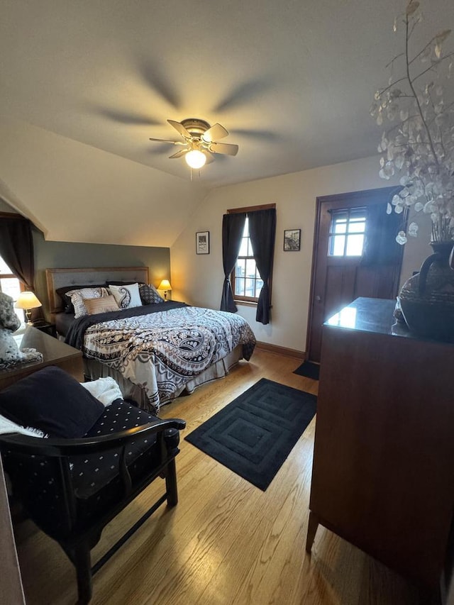 3216 Moorland Ave, Racine, WI 53405 - bedroom featuring baseboards, a ceiling fan, wood finished floors, and vaulted ceiling