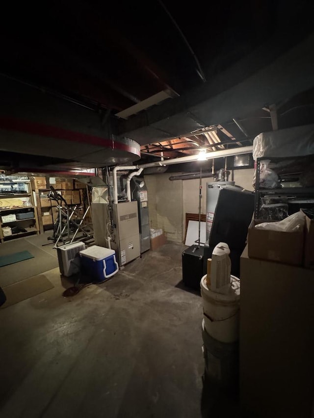 3216 Moorland Ave, Racine, WI 53405 - unfinished basement featuring heating unit and gas water heater