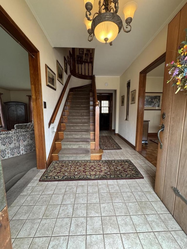 3216 Moorland Ave, Racine, WI 53405 - entrance foyer with light tile patterned floors, baseboards, and stairs