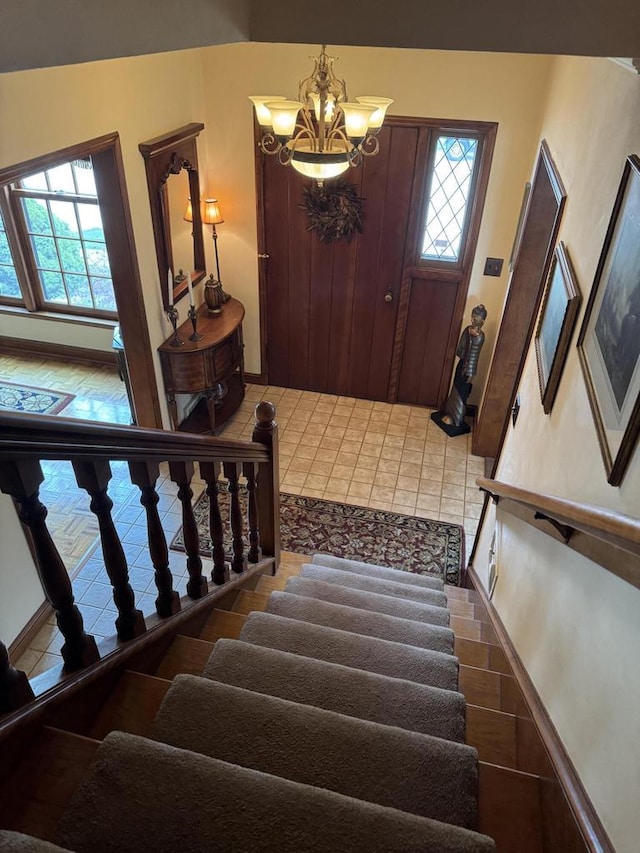 3216 Moorland Ave, Racine, WI 53405 - interior space featuring stairway and an inviting chandelier