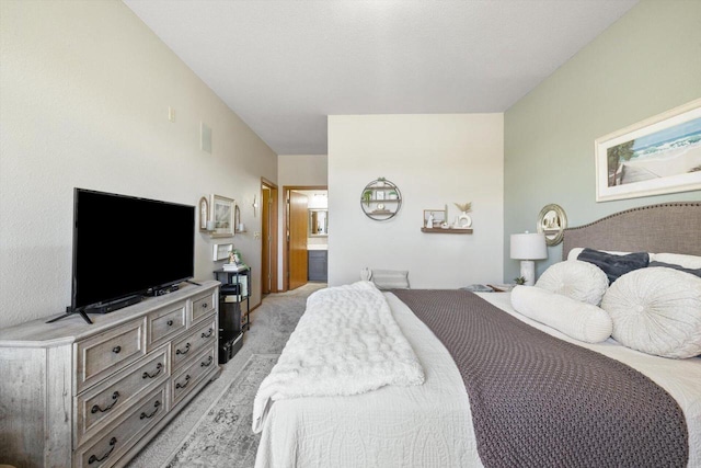 bedroom featuring light carpet and visible vents