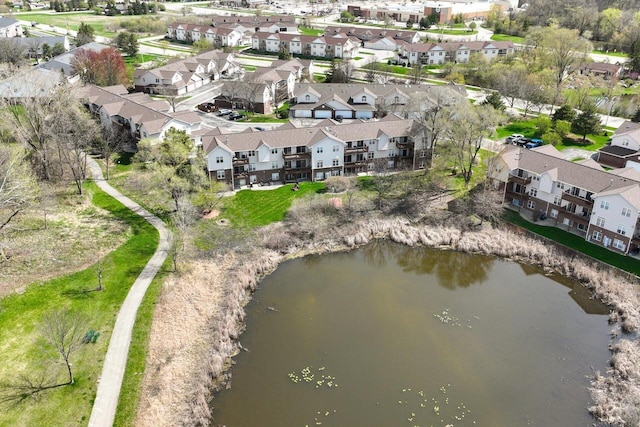 aerial view with a residential view and a water view