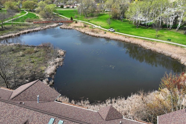 bird's eye view with a water view
