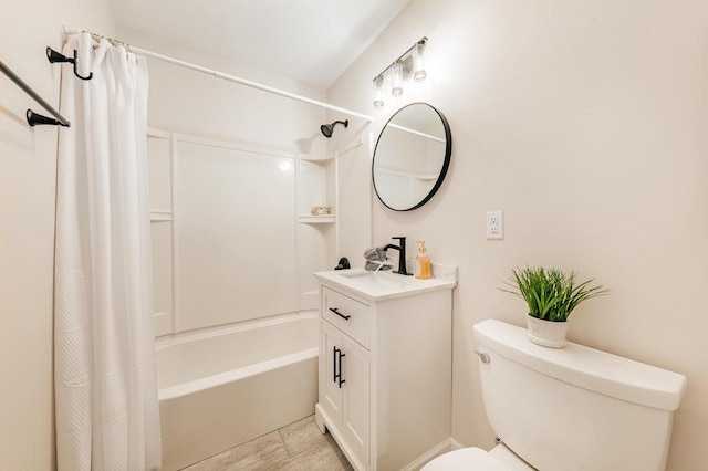 bathroom with vanity, shower / bathtub combination with curtain, and toilet