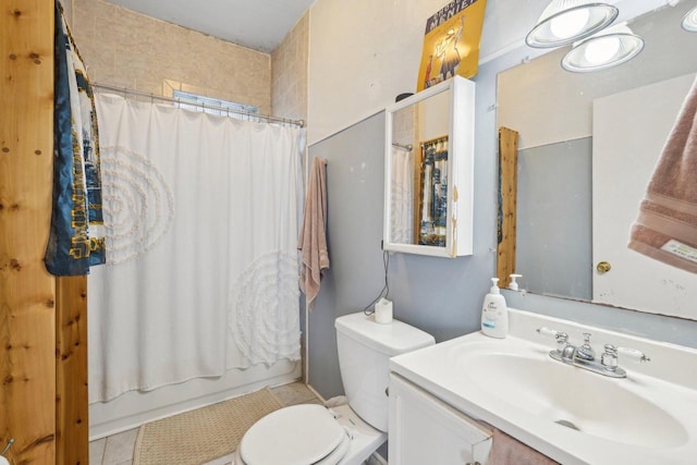 bathroom with vanity, shower / tub combo, tile patterned floors, and toilet