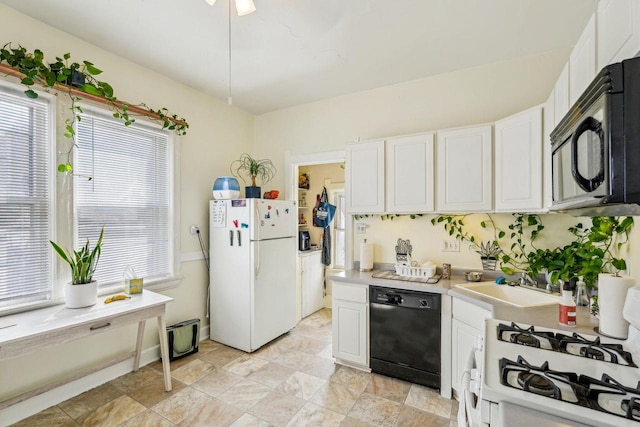 kitchen featuring white cabinets, a sink, black appliances, and light countertops