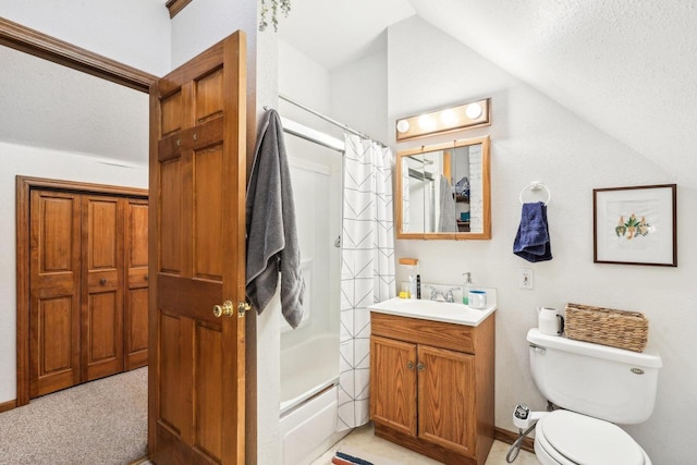 bathroom featuring vanity, shower / bath combination with curtain, and toilet