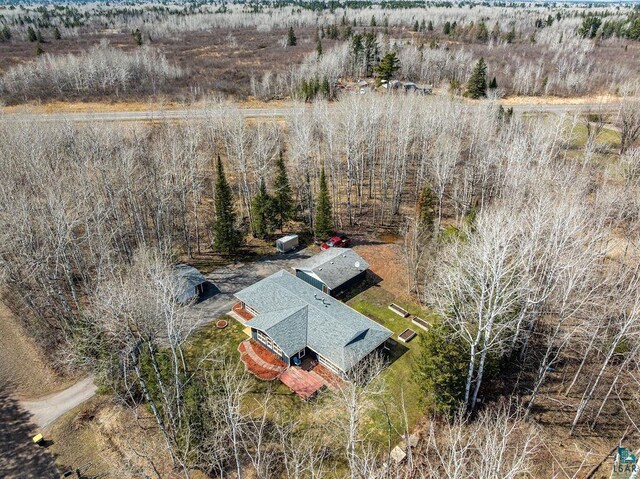 birds eye view of property with a rural view