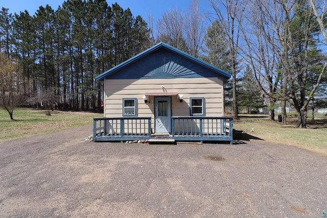 view of front of property with a deck