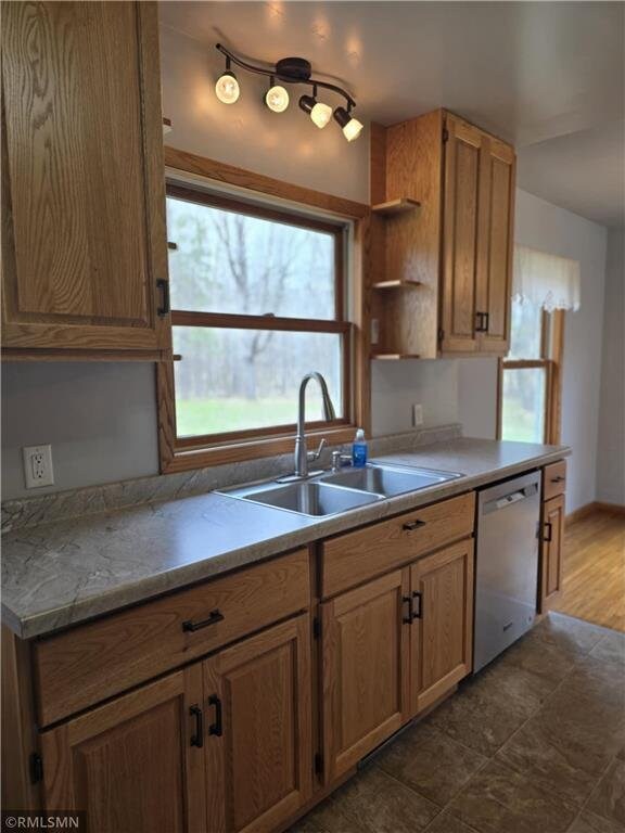 439 270th Ave, Cumberland, WI 54829 - kitchen featuring light countertops, open shelves, a sink, and dishwasher