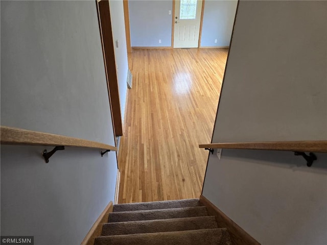439 270th Ave, Cumberland, WI 54829 - staircase with baseboards and wood finished floors