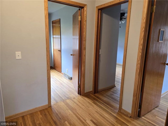 439 270th Ave, Cumberland, WI 54829 - corridor featuring baseboards, light wood-style flooring, and visible vents