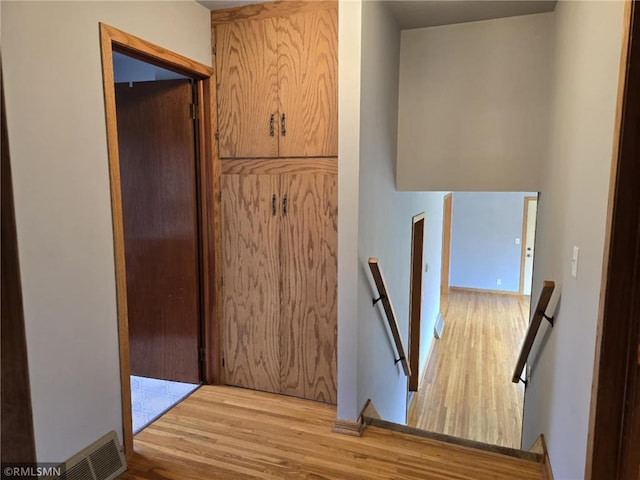 439 270th Ave, Cumberland, WI 54829 - staircase featuring visible vents and wood finished floors